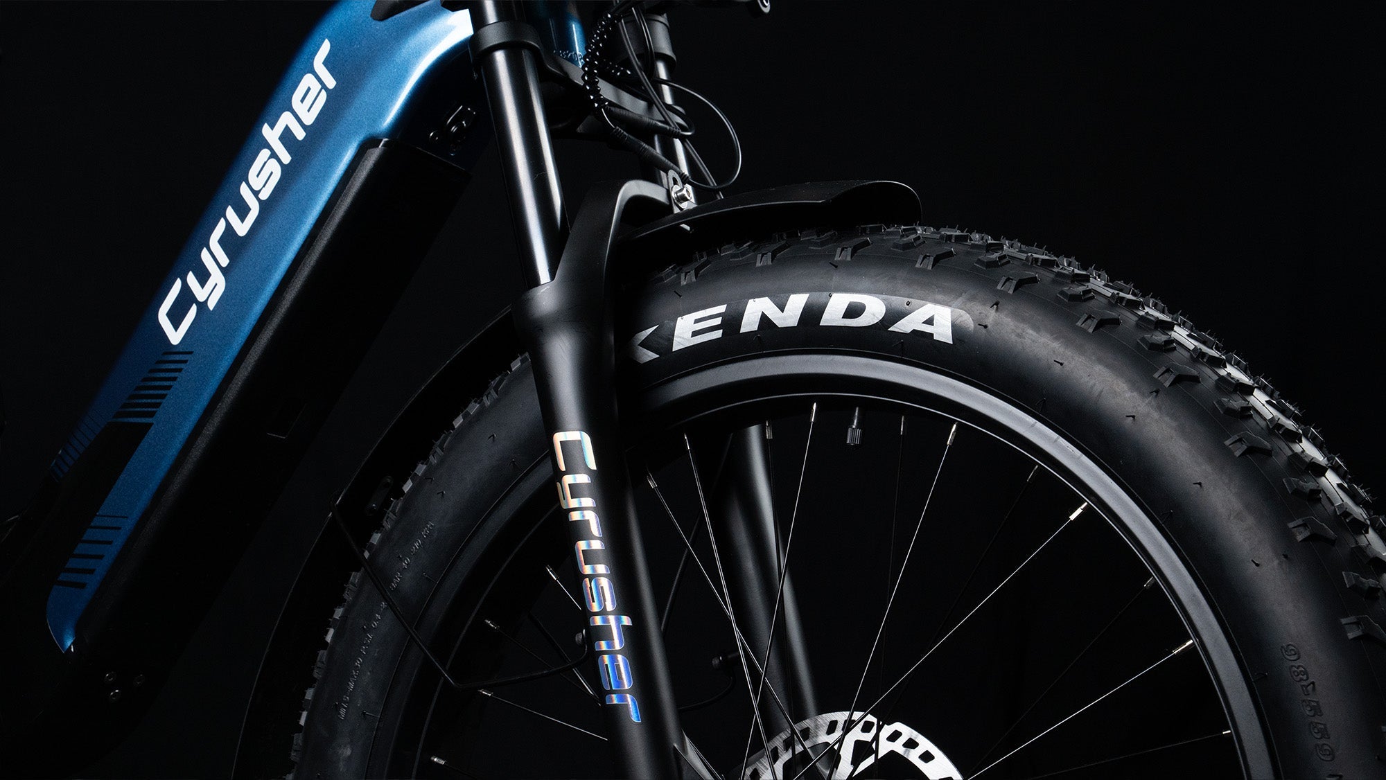 CYRUSHER Trax 2.0 step-thru electric bike — dual-crown fork and Kenda fat tyre
